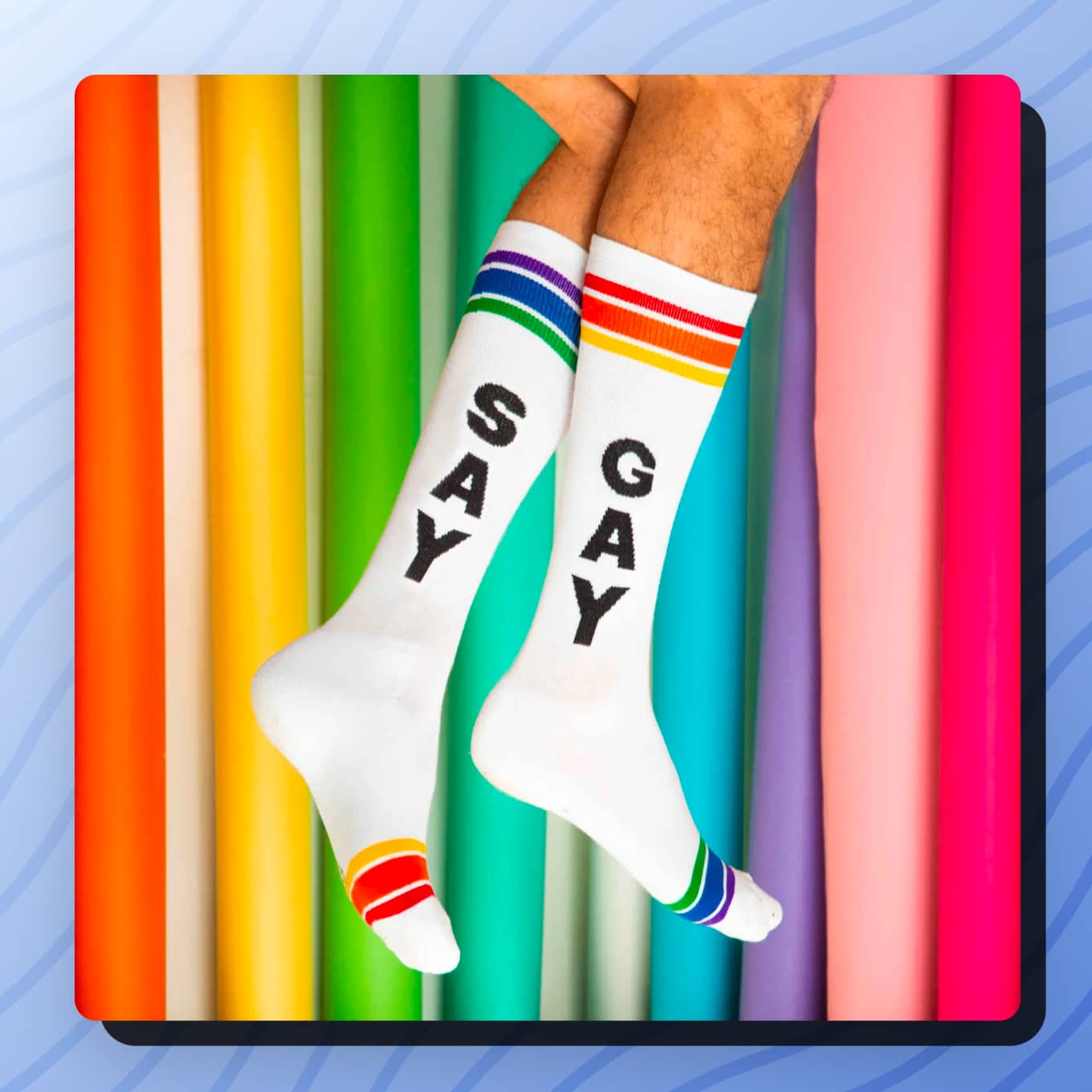 One sock that says Say and another sock that says Gay